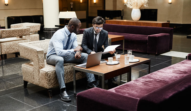 Digital marketeters working in a hotel